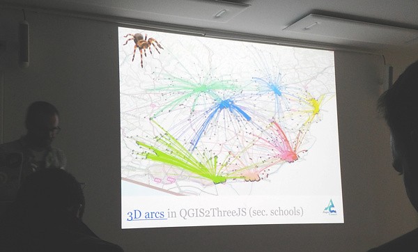Ross and a spider present school catchment visualizations at 
              FOSS4G UK 2018
